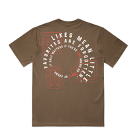 A brown short-sleeve t-shirt shown from the back, featuring a circular graphic print in white and red with the text 'FAVORITES ARE FORGOTTEN' and 'IT ONLY MATTERS IF YOU'RE IN ARENA'.