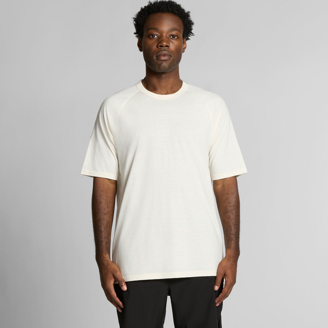 Men's Staple Active Blend Tee | Arena Custom Blanks - Arena Prints - Modeled Shot - Front