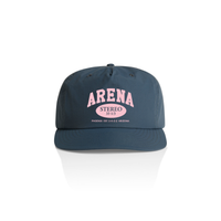 petrol blue cap with pink 'Arena Stereo' text on a white background